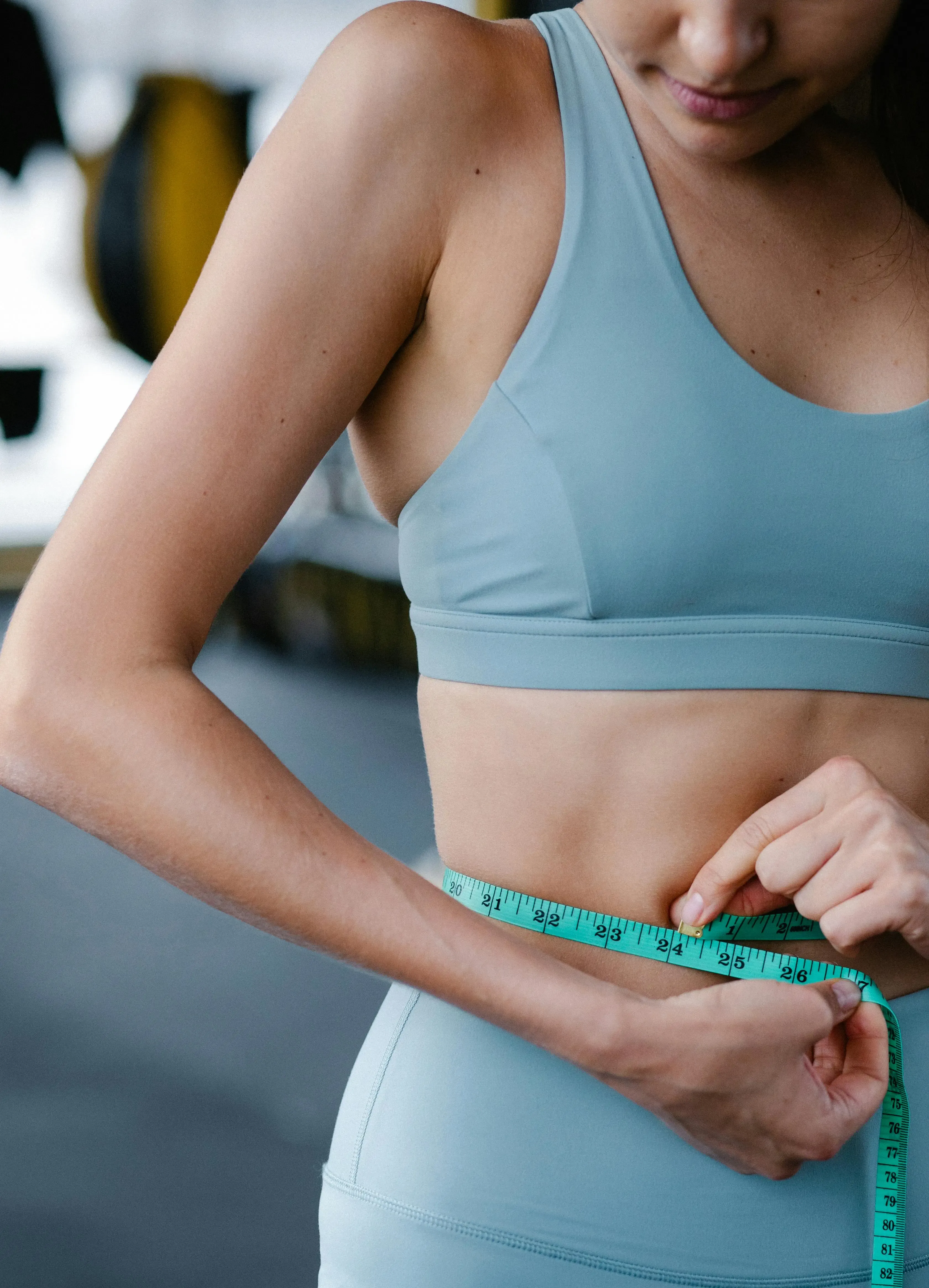 Woman feeling lighter and energized — Burntide daily gummy supporting healthy metabolism and steady weight management